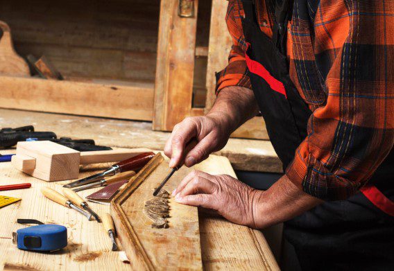 Carpenter-carving-wood
